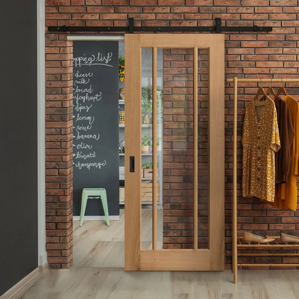 Oak Internal Unfinished Toledo 3 Light Clear Glass Sliding Door - Black Top Mounted
